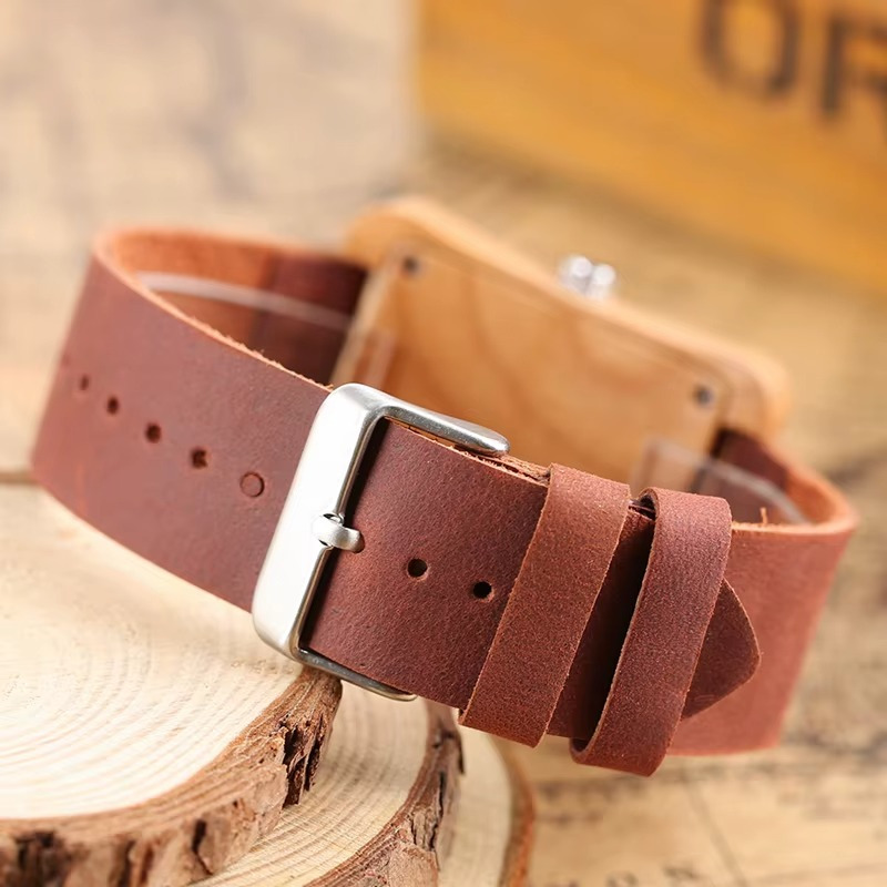 Bracelet en cuir marron de la montre Stockholm en bois mixte avec boucle argentée