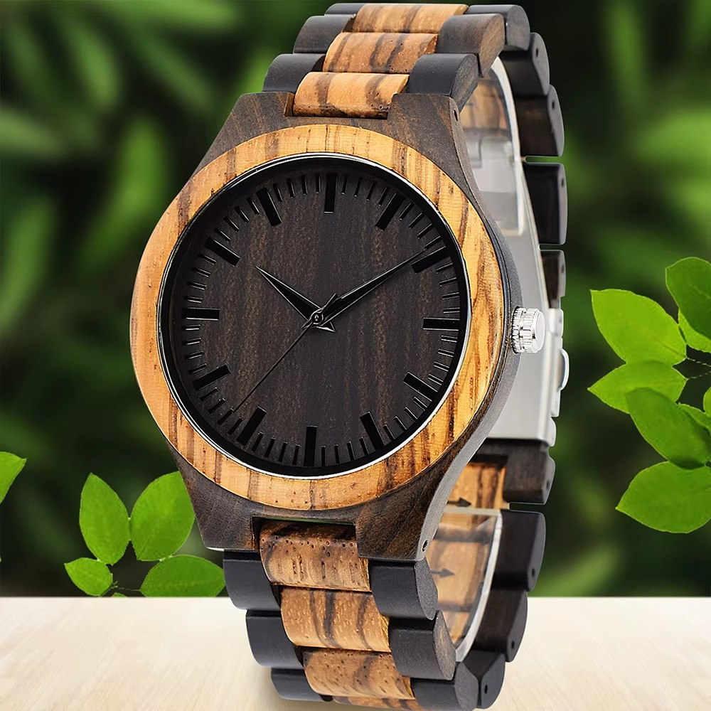 Montre Aspen en bois zébré avec cadran noir minimaliste et bracelet en ébène et bois zébré vue de face