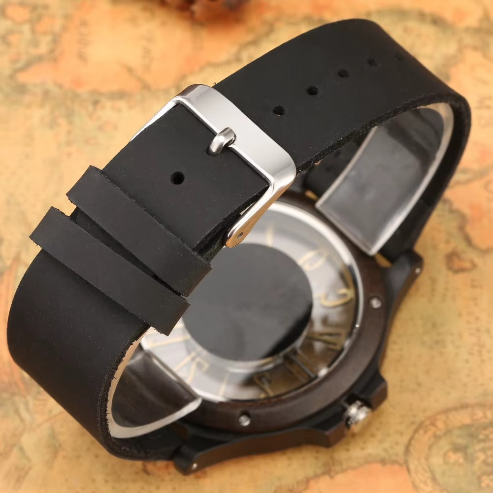 Montre Mirage pour homme avec bracelet en cuir noir et boucle ardillon en métal, cadran ajouré avec chiffres arabes visibles en arrière-plan