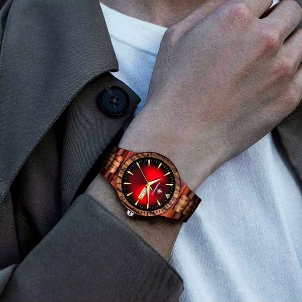 Montre Vulcain en bois bicolore avec cadran rouge, affichage jour et date, lunette crantée portée au poignet